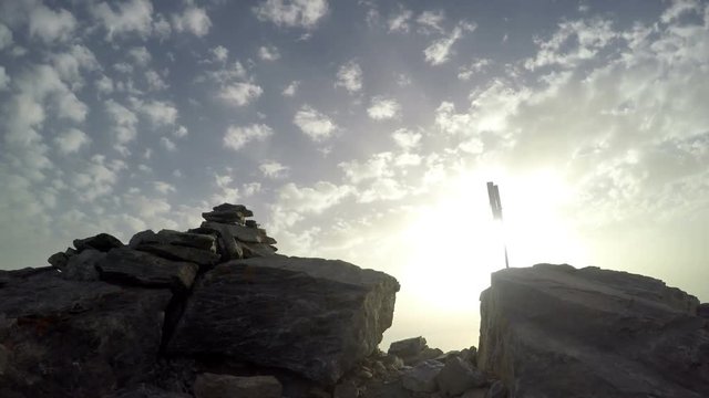 Mountain climber pov from helmet camera on top 