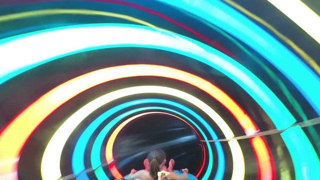 Father and daughter enjoyment on the water slide 