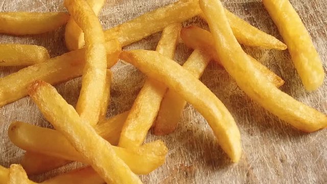 French fries fall on the table slow motion footage video