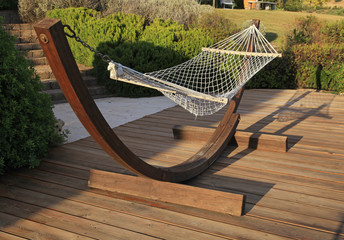 relax hammock on wood terrace on a sunny day