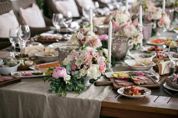 Luxury, elegant wedding reception table arrangement, floral centerpiece