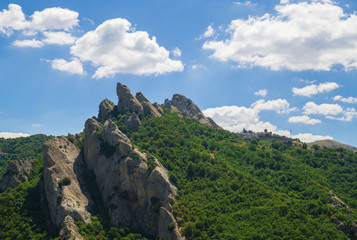 Naklejka premium Castelmezzano (Italy) - A little altitude village, dug into the rock in the natural park of the Dolomiti Lucane, Basilicata region, famous also for the spectacular 