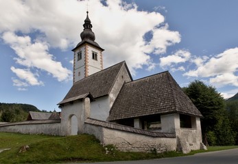 Fototapeta na wymiar Cerkev Sv. Janeza Krstnika church in Ribčev Laz on Bohinj lake in Triglav national park in Slovenia