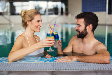 Happy couple enjoying spa wellness resort