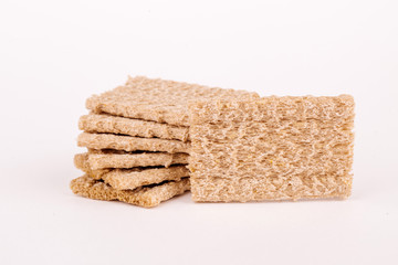 Group of healthy crispbreads on white background.
