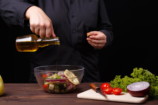 Chef Pouring Oil On Greek Salad, Cooking Process, Restaurant Concept