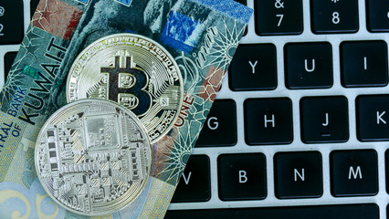 Bitcoin on Kuwait dinar banknote