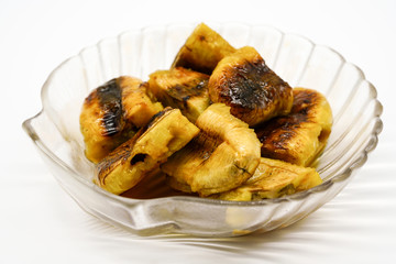 Coconut- Caramel Sauce on top of grilled Bananas in luxury glass