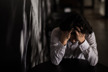 business man is stressed from his work.  negative thinking concept.