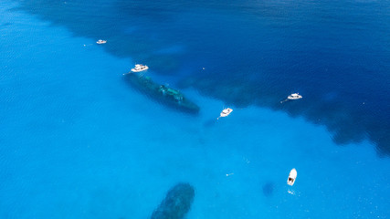 Dive boats over the shipwreck of the USS Kittiwake in the Cayman Islands, Caribbean