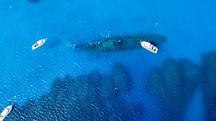 SCUBA diving boats over the wreck of the USS Kittiwake in the Cayman Islands