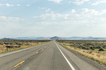 Fototapeta na wymiar Empty Desert Highway