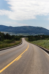 Curved Highway and Green Hills