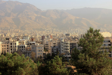 Obraz premium Iran-October 2016 : View of a part of Tehran with office buildings and residences.More than half of Iran's industry is based in Tehran include automobiles,textiles and chemical products.