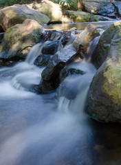 Fototapeta na wymiar Waterfall in a stream
