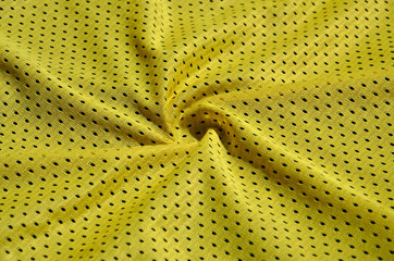 Texture of sportswear made of polyester fiber. Outerwear for sports training has a mesh texture of...
