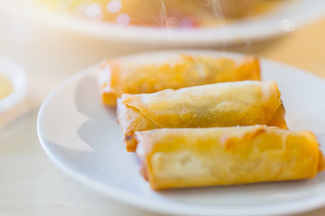 crispy spring rolls on white plate background Thai delicious popular food appetizer