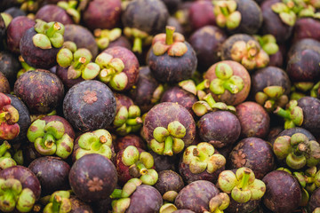 mangosteen tropical fruit sale at street market in Thailand asian.