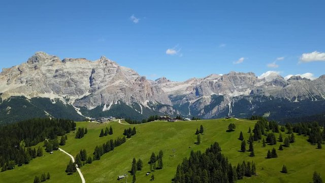 Fantastic landscape on the Dolomites. Drone aerial view on the peaks called Sas Crusc, Lavarela, Conturines and Pizes de Fanis. Place is Alta Badia, Sud Tirol, Italy