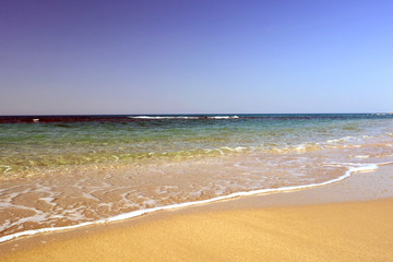Fototapeta na wymiar sea sand sky and summer day