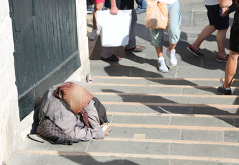 gypsy woman with headscarves on her head and long skirt calls al