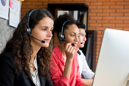 Multiethnic telemarketing customer service agents, call center job concept