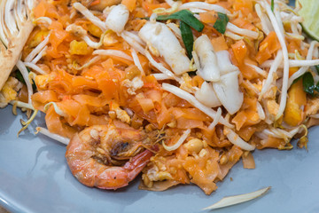 seafood pad thai on plate