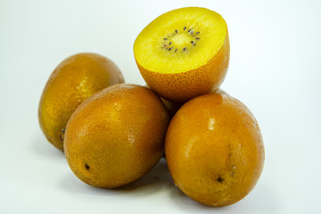 Fresh Yellow Flesh Kiwi Fruit Isolated on White Background.