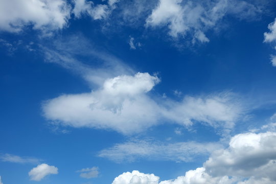 Blue Sky with Cloud Background. © mesamong