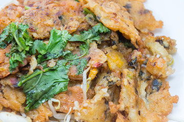 oysters fried in egg batter (Hoi Tod) on plate