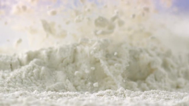 Сlose up of Pouring Flour Powder.