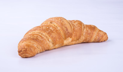 croissant or tasty croissant on the background.
