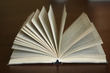 a book opened on table 