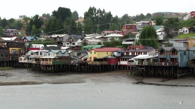 Shot of old colourful wooden stilt houses on the Chiloe Island, Chile