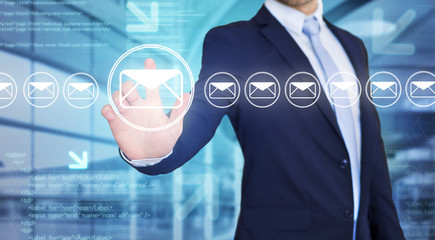 Businessman touching technology interface with professional email  icon