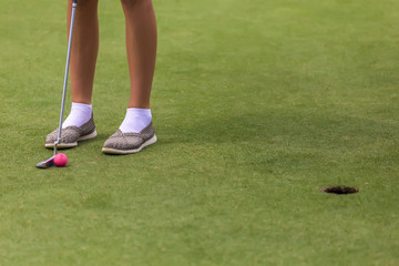 Fototapeta premium Low section of female golf player