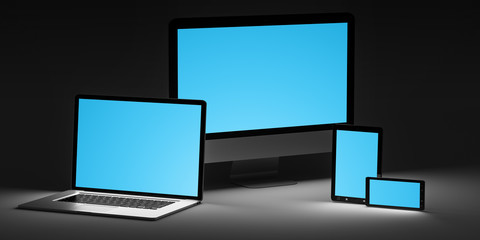 Fototapeta premium Dark modern computer laptop mobile phone and tablet 3D rendering