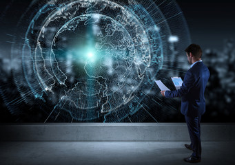 Businessman watching digital planet earth interface on a rooftop 3D rendering