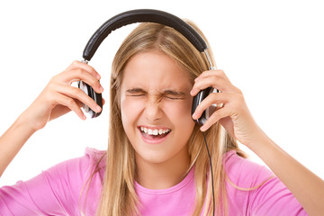 Teenage girl screaming with headphones  isolated