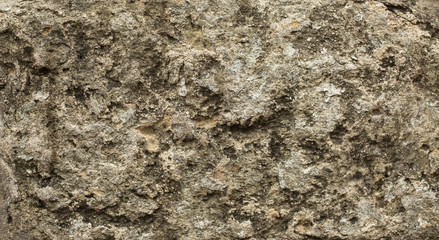 Naklejka premium Old stone wall background, brick wall grunge texture close up.