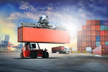 Logistics import export background and transport industry of forklift handling container box...