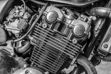 Detail of motorcycle engine for transportation or technology concept design. Black and white.