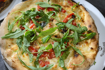 Italy,Naples; pizza with arugula.