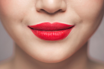 Fototapeta premium Red Sexy Lips closeup. Make up concept. Beautiful Perfect Lips.