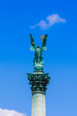 Millennium Monument on the Heroes' Square. Blurred-unrecognizable faces of people. Is one of the most-visited attractions in Budapest squares in Budapest, Hungary.