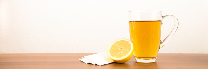 Tea with lemon and handkerchiefs during a disease