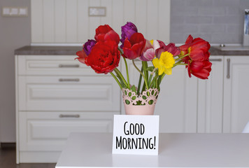 bouquet of red  tulips with good morning message card