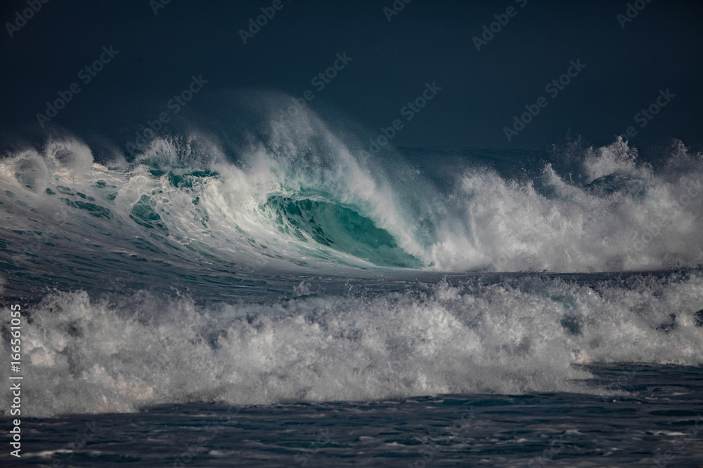 Wall mural huge waves crashing in ocean. seascape environment background. water texture with foam and splashes.