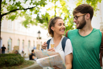 Happy group of tourists traveling and sightseeing