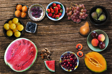 Summer fruits. Watermelon, melon, yellow plum, apricot, mulberry, blackberry, strawberry, grape, fig, pear, peach, plum, nectarine, cherry, nut, walnut